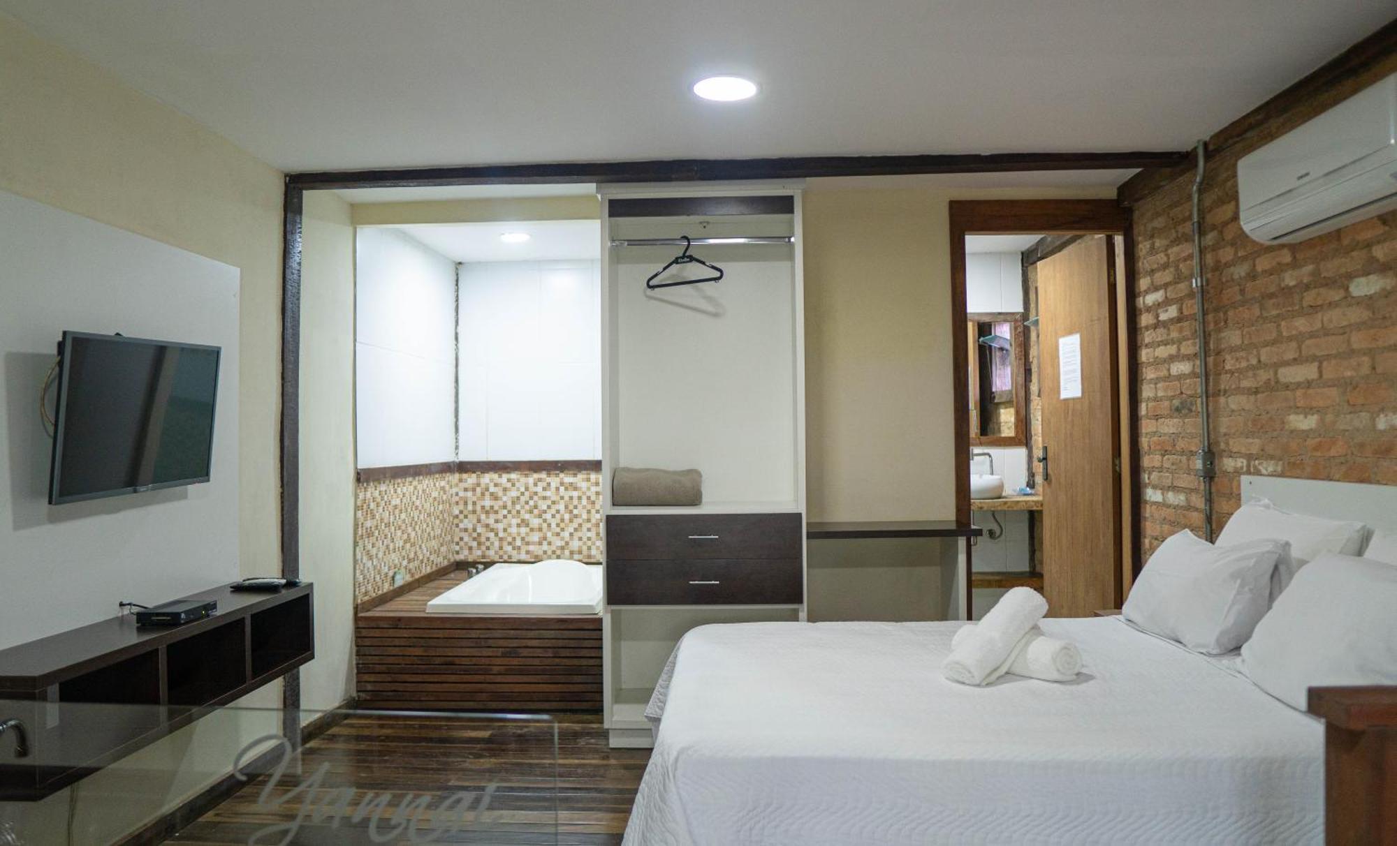 Quarto Quádruplo Premium